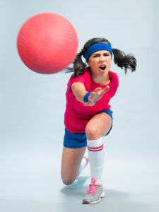 an angry woman playing dodgeball